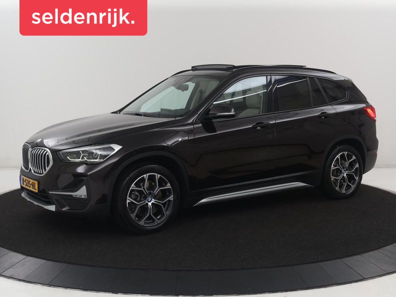 BMW X1 - xDrive25e Business Edition Plus | SOH 91,4% | Panoramadak | Leder | Stoelverwarming | Sfee - AutoWereld.nl