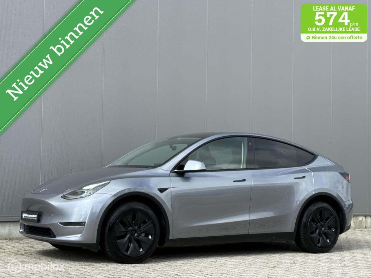 Tesla Model Y - Long Range AWD 2023 - SOH 92% - FSD - Trekhaak - AutoWereld.nl