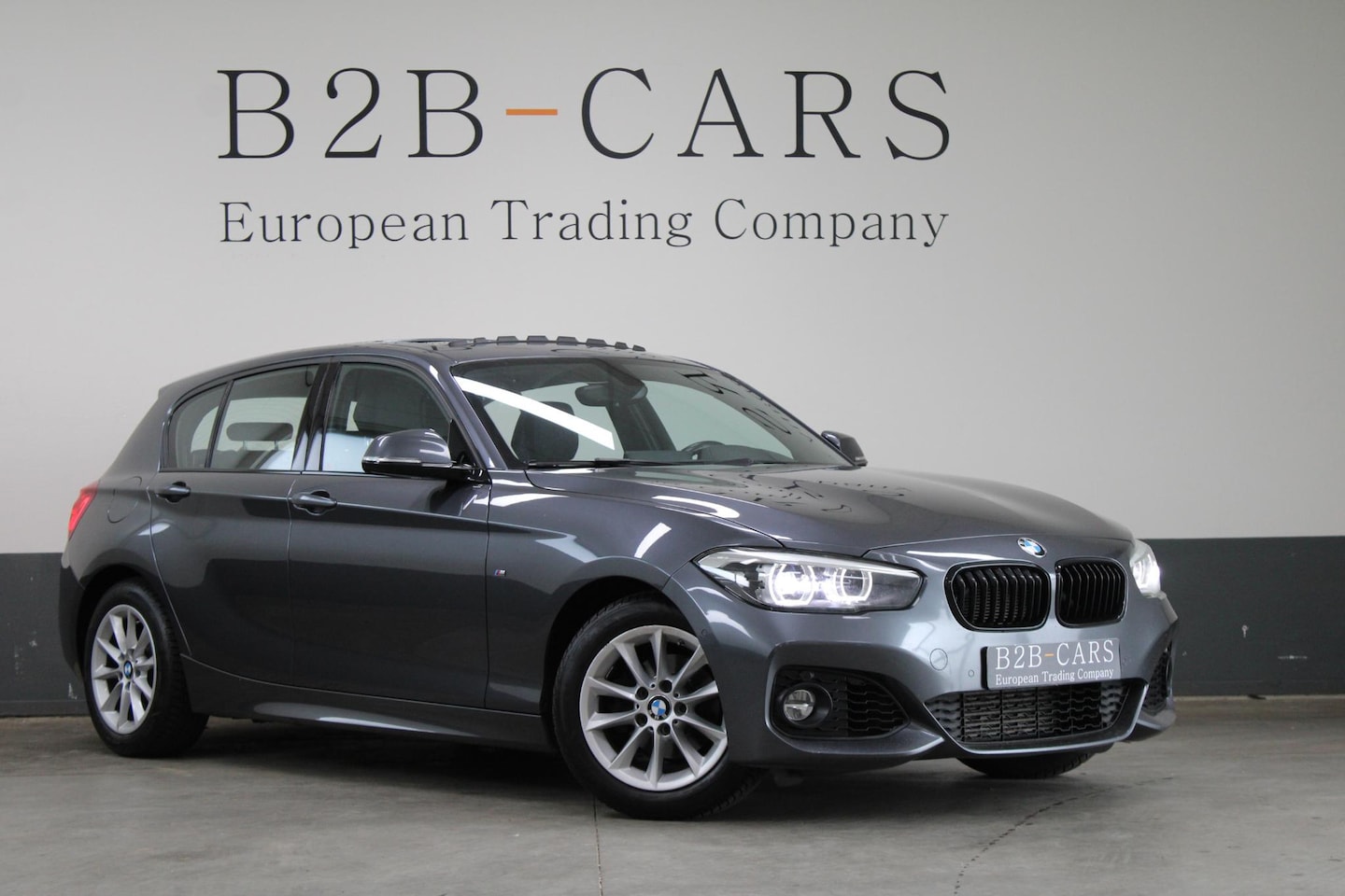 BMW 1-serie - 118i Edition M Sport Shadow | Schuifdak | Leder | LED - AutoWereld.nl