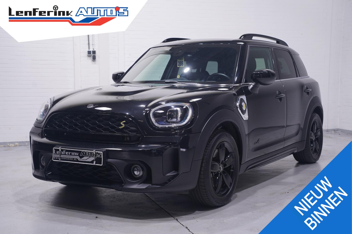 MINI Countryman - Cooper SE ALL4 Classic Trim SOH 94% Apple Carplay Navi Verwarmde sportstoelen lederen bekl - AutoWereld.nl