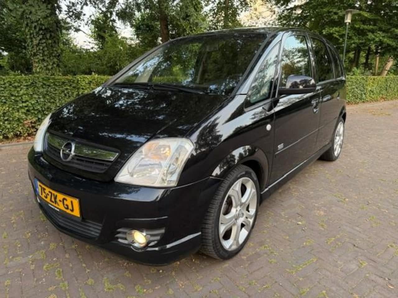 Opel Meriva - 1.6-16V Cosmo OPC-Line/Navi/Nieuwe apk - AutoWereld.nl
