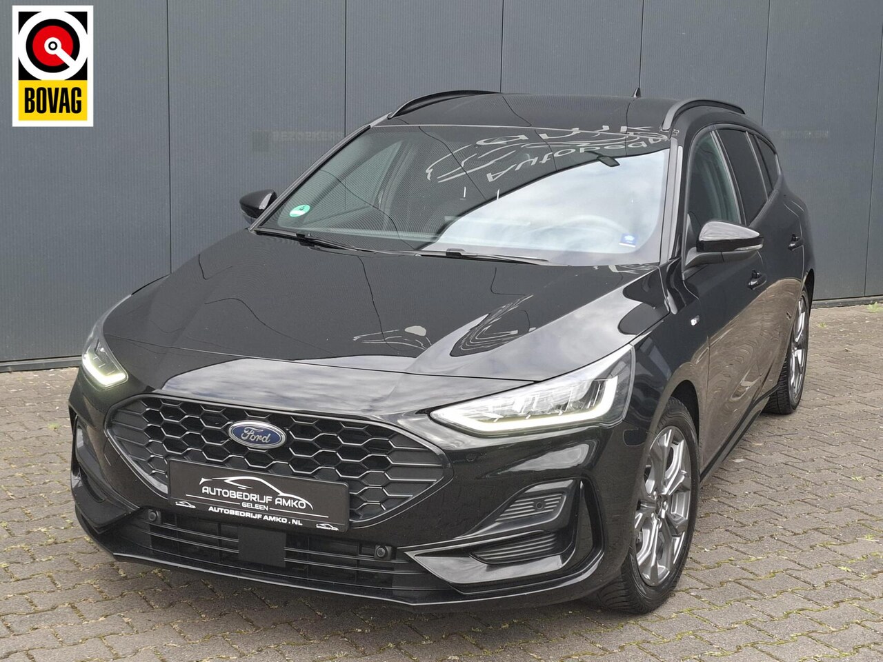 Ford Focus Wagon - 1.0 EcoBoost Hybrid ST Line / ADAP. CRUISE. / STOEL EN STUURVERW. / NAVI / DAB / - AutoWereld.nl