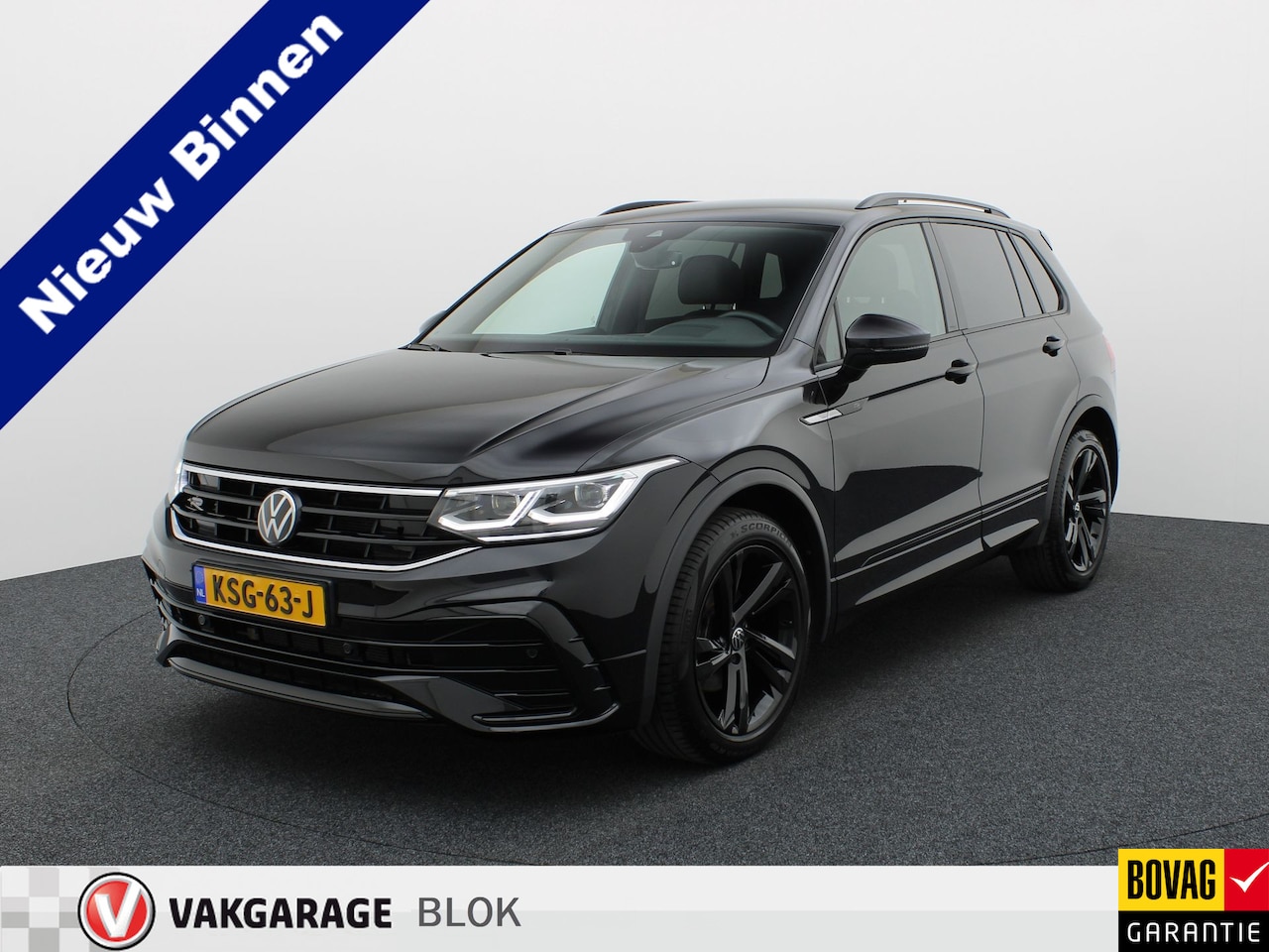 Volkswagen Tiguan - 1.5 TSI R-Line Business | Black Style | Head Up | Keyless | IQ Light | Trekhaak wegkl. | C - AutoWereld.nl