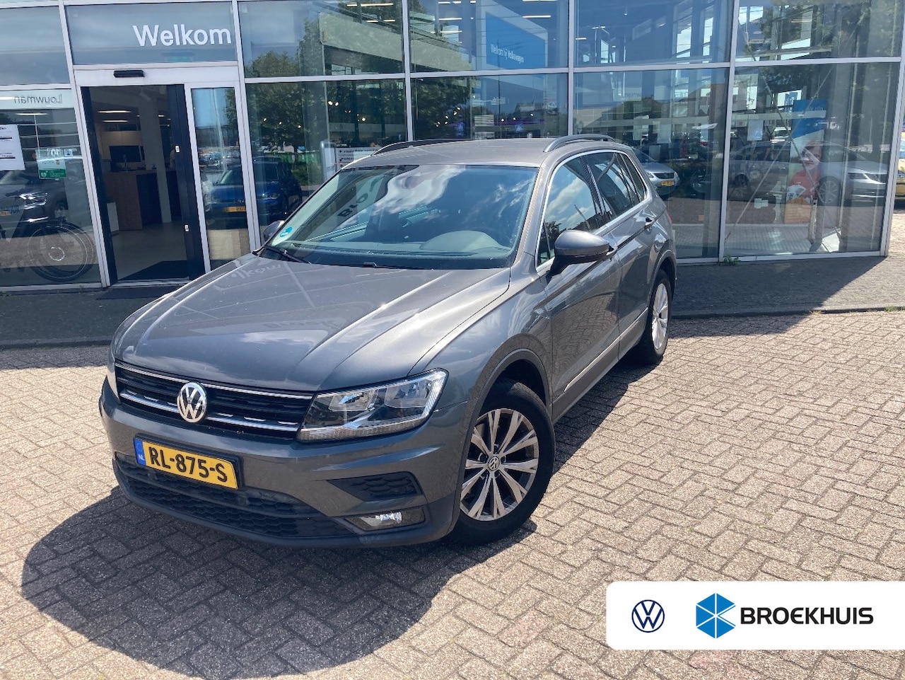 Volkswagen Tiguan - 1.4 TSI 150PK DSG-6 Comfortline | TREKHAAK | NAVIGATIE | 17 INCH | ADAPT. CRUISE | 1E EIGE - AutoWereld.nl
