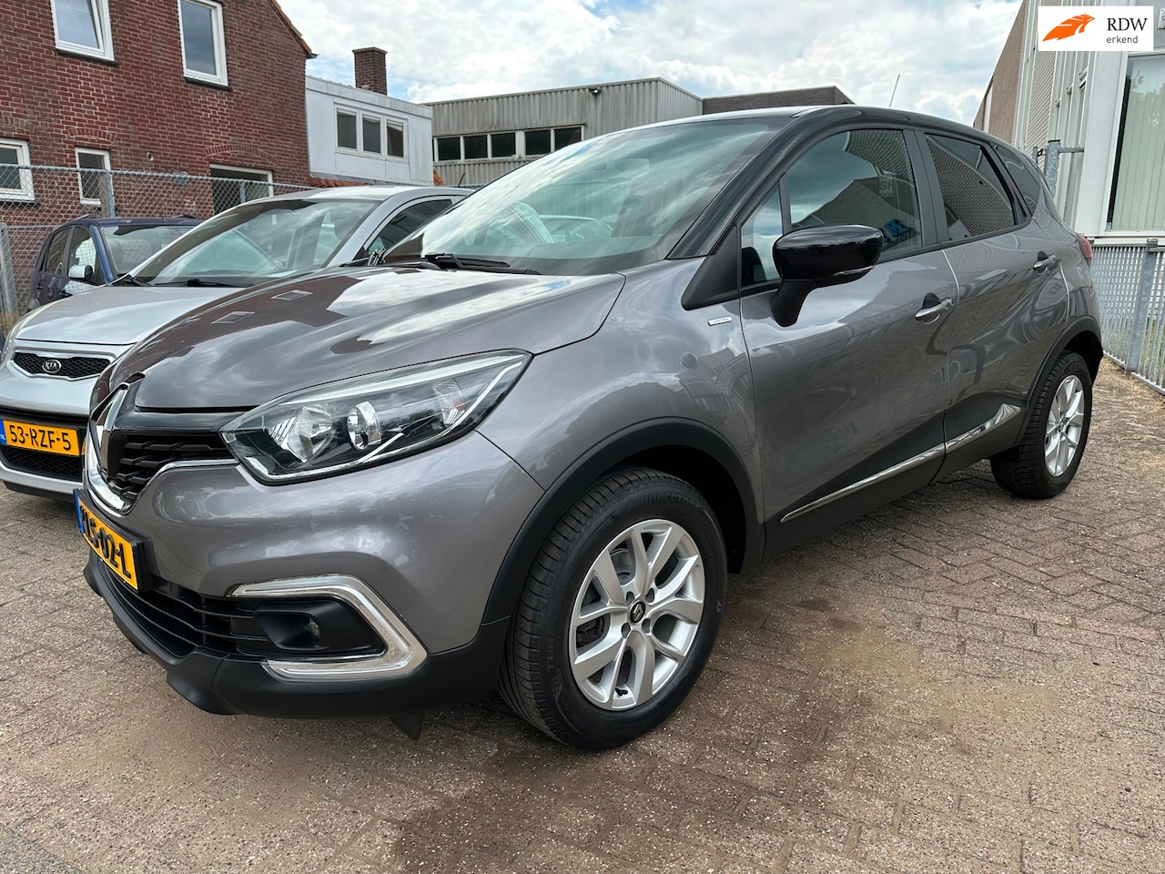 Renault Captur - 0.9 TCe Limited * PDC * NAVI * CRUISE * - AutoWereld.nl