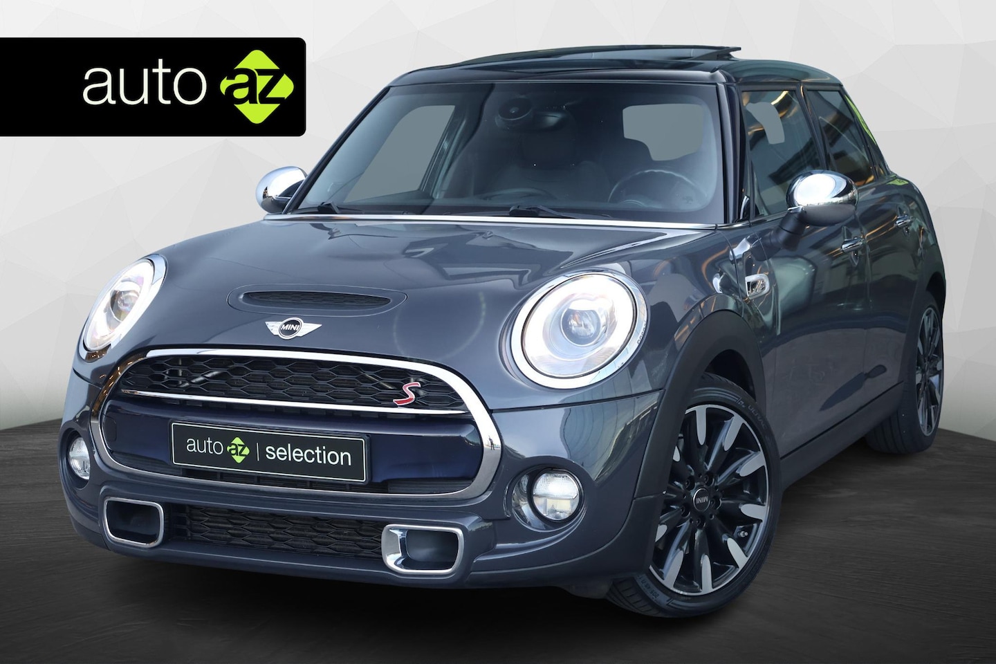 MINI 5-Deurs - 2.0 Cooper S Chili Serious Business / Panorama / Stoelverwarming - AutoWereld.nl