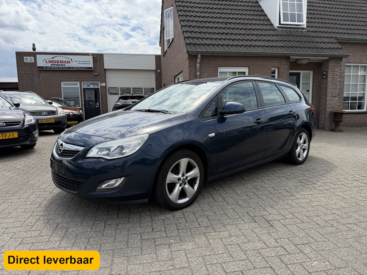Opel Astra Sports Tourer - 1.4 Turbo Edition Airco Navigatie - AutoWereld.nl