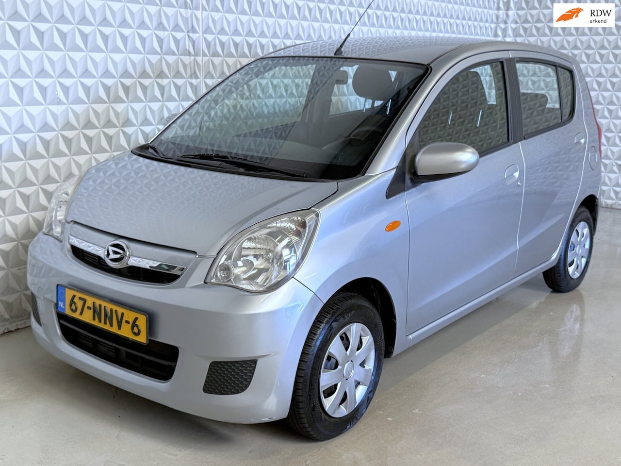 Daihatsu Cuore - 1.0 Comfort Airco AUTOMAAT / 87.000km (2010) - AutoWereld.nl