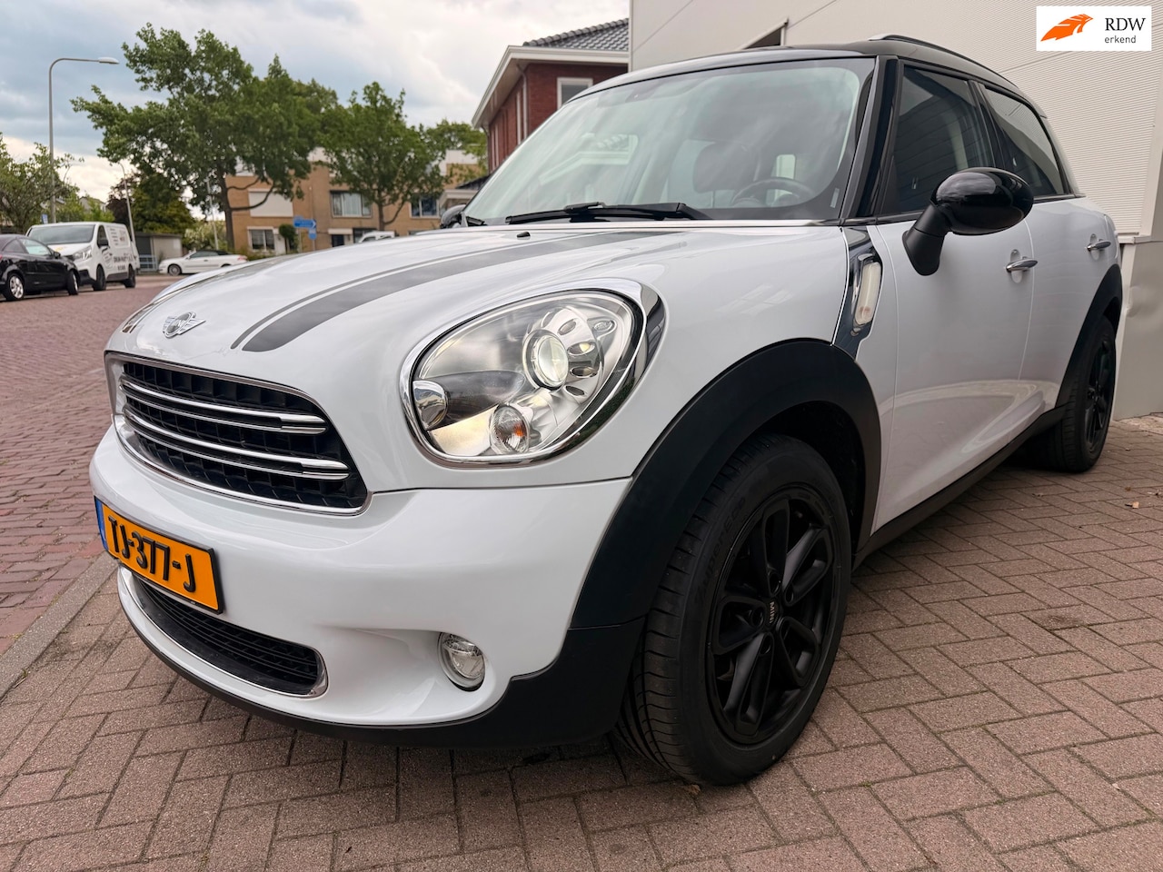 MINI Countryman - 1.6 Cooper Chili/Pano/Leder/Navi/Stoel verwarming/Cruise-c/Climate-c/Sfeer verlichting/key - AutoWereld.nl