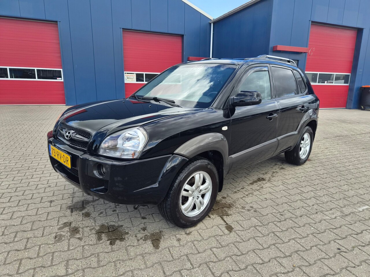 Hyundai Tucson - 2.0i Style LPG - AutoWereld.nl