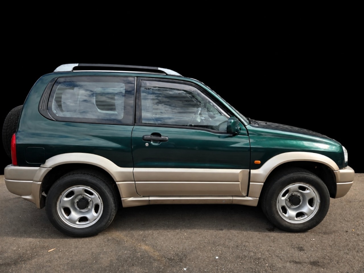 Suzuki Grand Vitara - 2.0 Metal Top Wide B - AutoWereld.nl