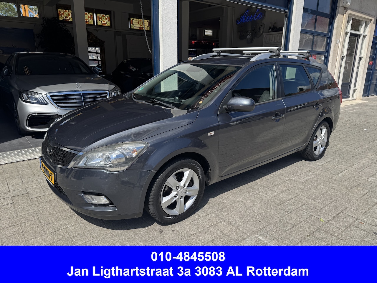 Kia Cee'd - 1.4 CVVT Seven NAVI/CAMERA/AIRCO - AutoWereld.nl