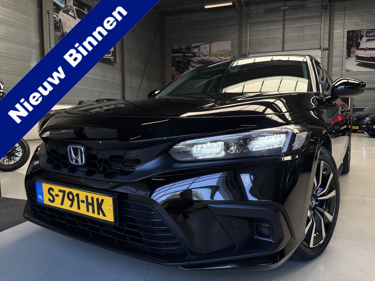 Honda Civic - 2.0 e:HEV Elegance Adapt Cruise, Automaat, Camera - AutoWereld.nl
