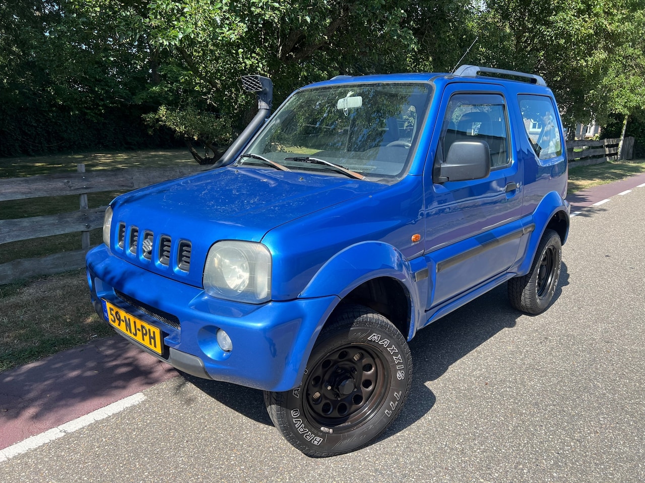 Suzuki Jimny - 1.3 S-Limited 4x4 Trekhaak - AutoWereld.nl