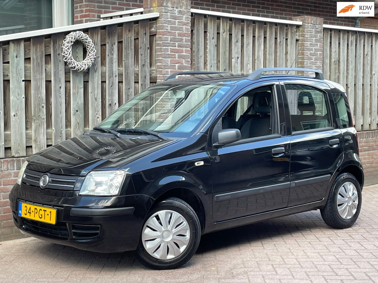 Fiat Panda - 1.1 Magic Elec.ramen, 77DKM, Zwart, APK 03-2027! - AutoWereld.nl