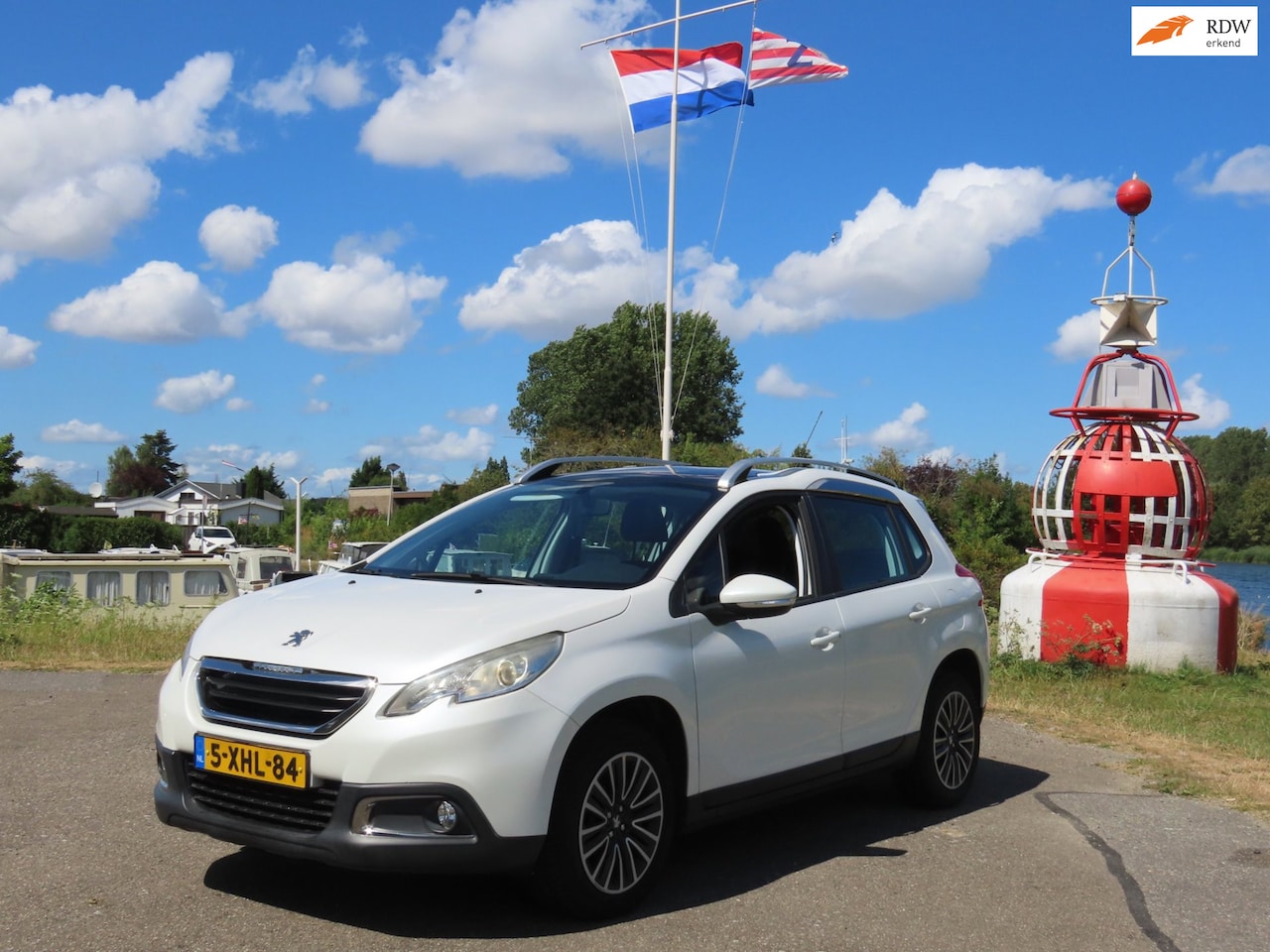 Peugeot 2008 - 1.2 VTi Active *PANO *NAVI *CRUISE *TREKHAAK - AutoWereld.nl