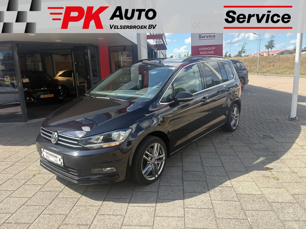 Volkswagen Touran - 1.5 TSI Comfortline Business 7p | Navi | Trekhaak | Cruise | 118.802 km Dealeronderhouden - AutoWereld.nl