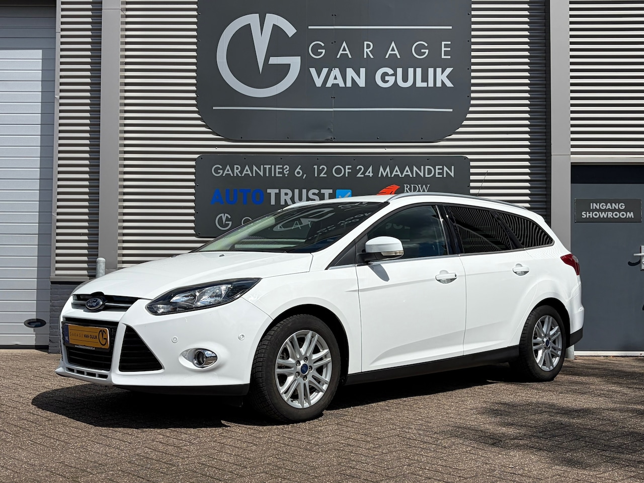 Ford Focus Wagon - 1.6 TI-VCT Titanium 105PK Cruise,Clima,ElektrRamen+Spiegels,Stoelverwarming,Isofix,ParkAss - AutoWereld.nl