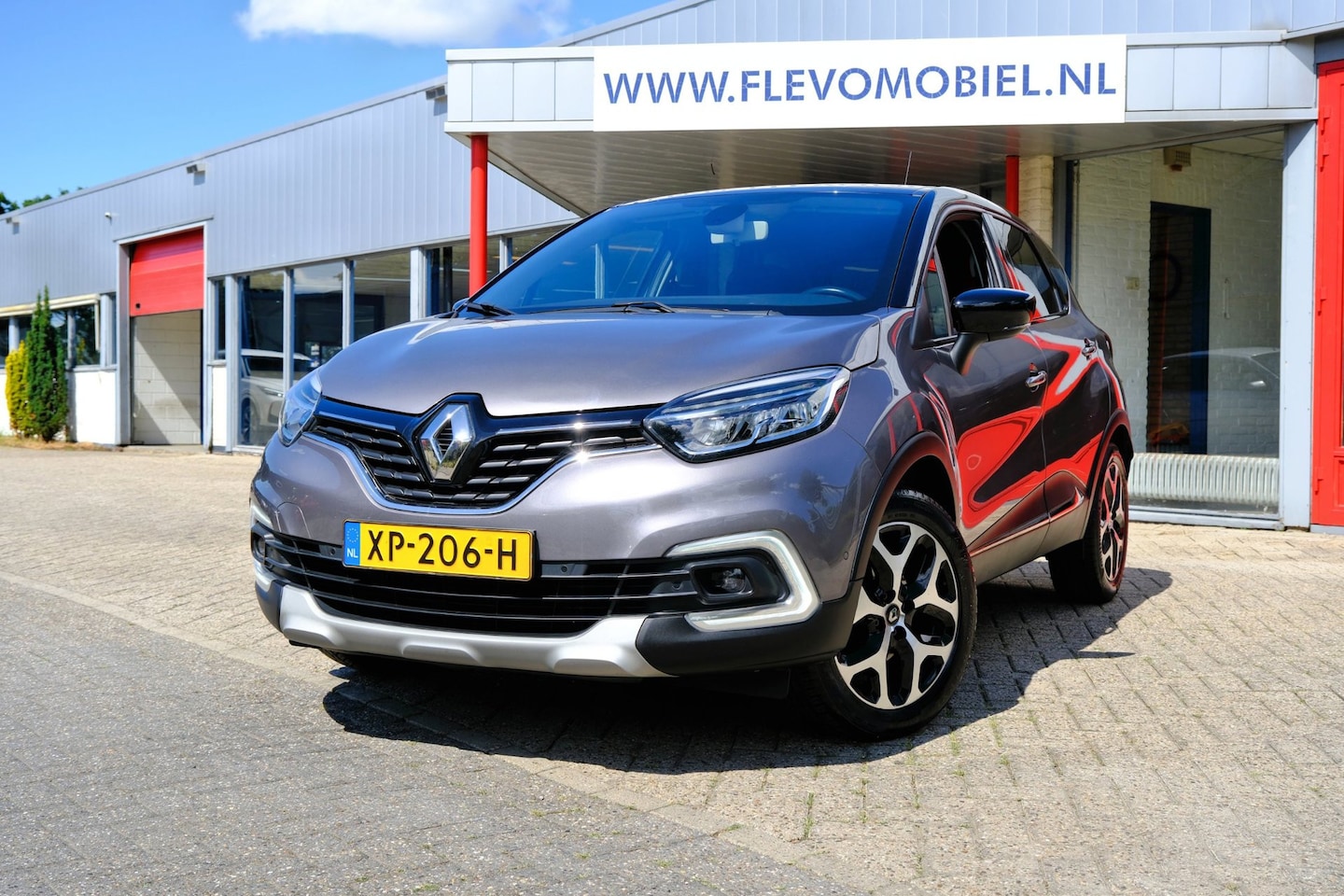 Renault Captur - 1.3 TCe Intens Navi|Cam|ParkAssist|Clima|LMV - AutoWereld.nl