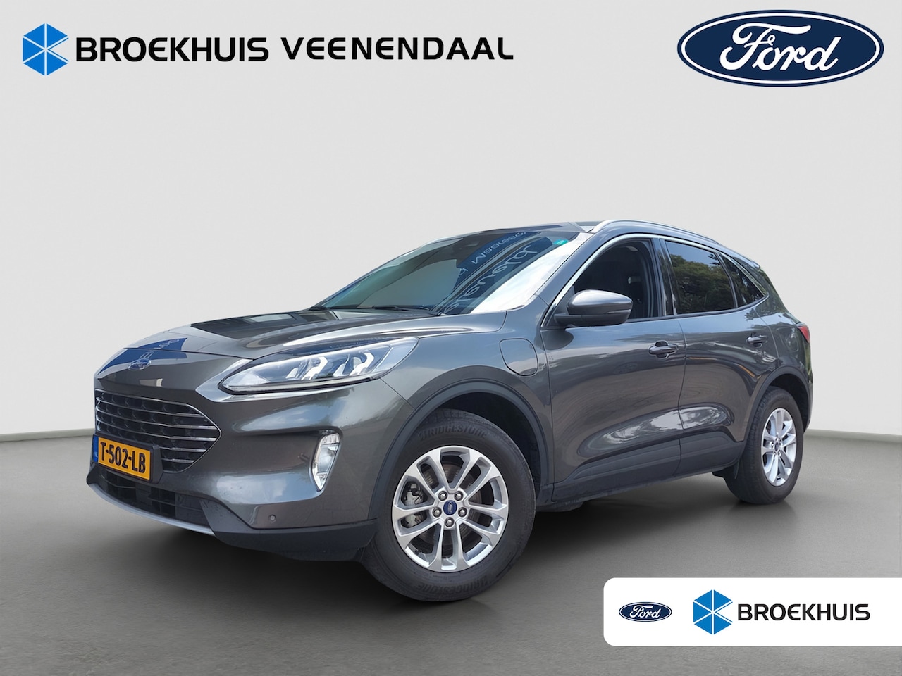 Ford Kuga - 2.5 PHEV Titanium | Trekhaak | Stoelverwarming | Camera | Cruise Control | Navigatie | App - AutoWereld.nl