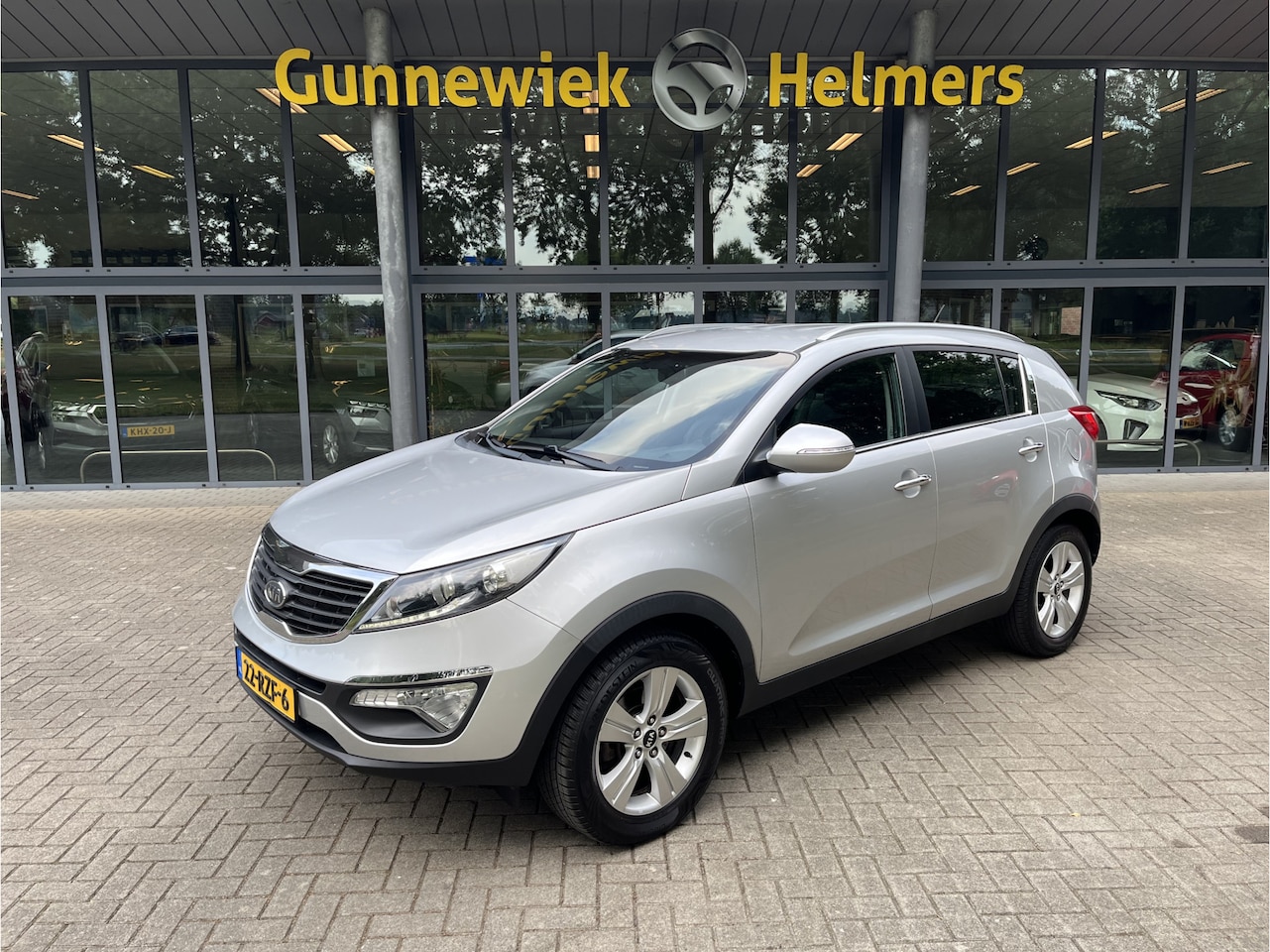 Kia Sportage - 1.6 GDI X-ecutive Plus Pack | AFN. TREKHAAK | CLIMA | BT | HALF LEER - AutoWereld.nl