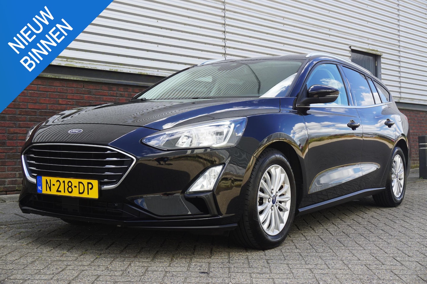 Ford Focus Wagon - 1.0 EcoB.125PKHybrid Titanium X Business/Trekhaak/ Dealeronderhouden. - AutoWereld.nl