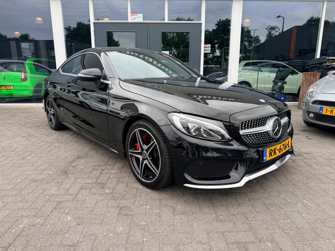 Mercedes-Benz C-klasse Coupé - 200 Prestige/Amg Pakket/Apple CarPlay/Half Leer. - AutoWereld.nl