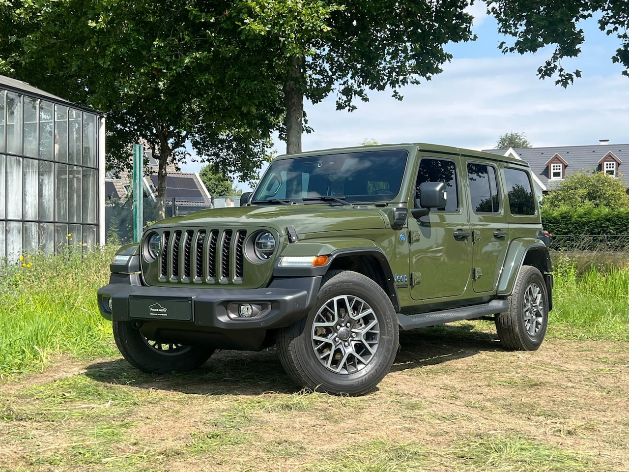 Jeep Wrangler Unlimited - 4xe 380 80th Anniversary |SARGE GREEN|TREKHAAK|CAMERA V+A|STUUR+STOELVERW.|LEASE EURO 691 - AutoWereld.nl
