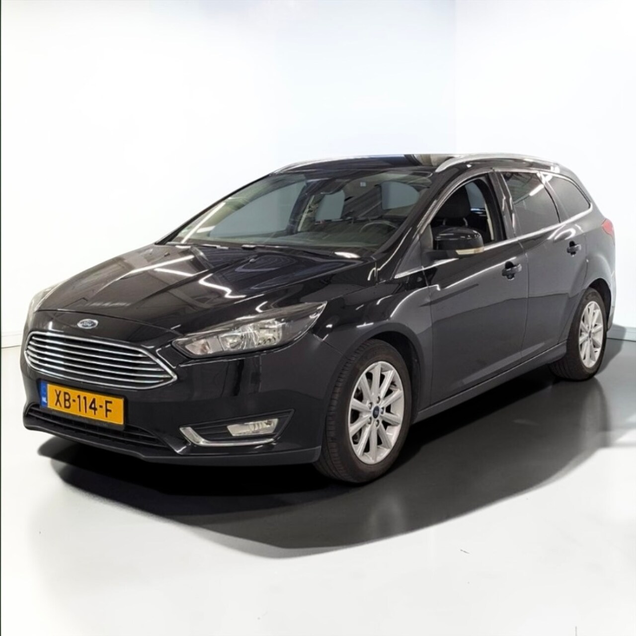 Ford Focus Wagon - 1.0 Titanium parkeersensoren NAVI AIRCO - AutoWereld.nl