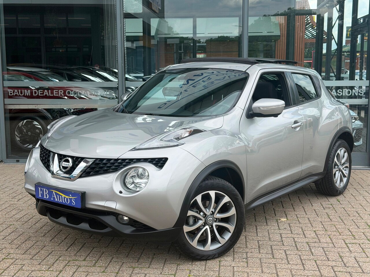 Nissan Juke - 1.2 DIG-T S/S Tekna Airco Lmv Cruise Navi Camera Pano Leder - AutoWereld.nl