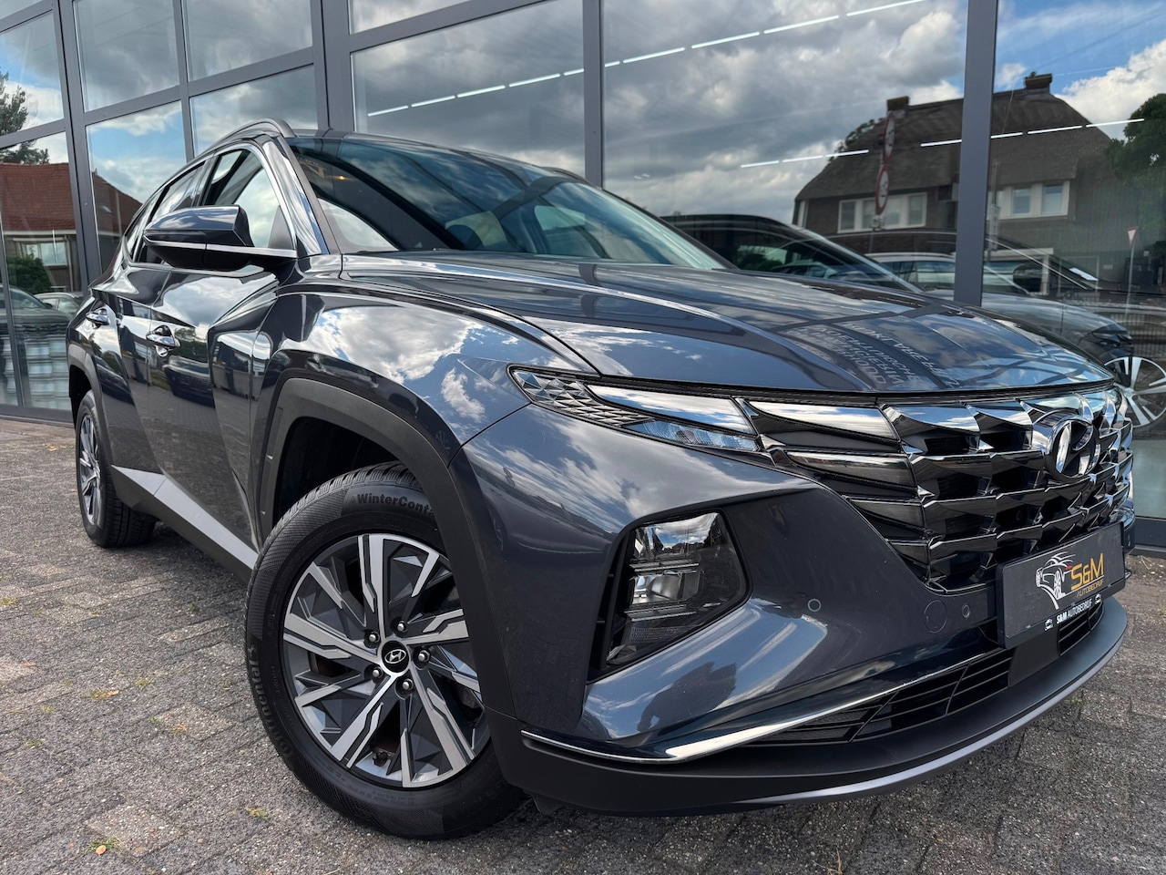 Hyundai Tucson - 1.6 T-GDI HEV Comfort 1.6 T-GDI HEV Comfort - AutoWereld.nl