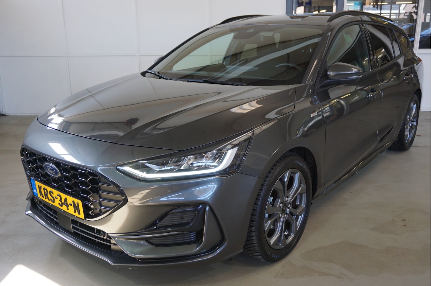 Ford Focus Wagon - 1.0 EcoBoost Hybrid ST Line Navigatie Camera - AutoWereld.nl