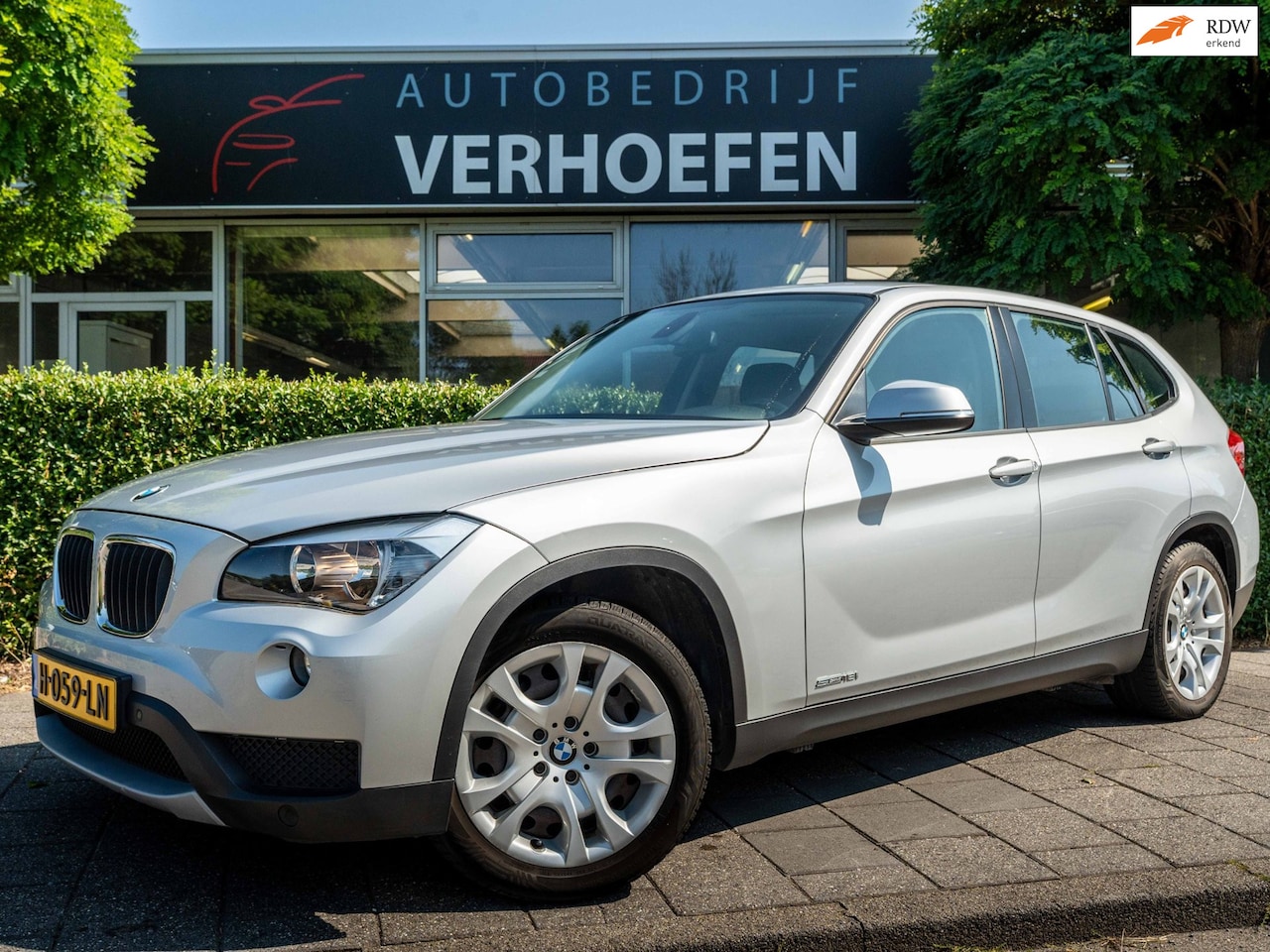 BMW X1 - SDrive18i - AUTOMAAT - NAVIGATIE - TREKHAAK - LEDER - CRUISE / CLIMATE - MEMORY SEATS - PD - AutoWereld.nl