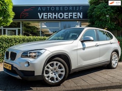 BMW X1 - SDrive18i - AUTOMAAT - NAVIGATIE - TREKHAAK - LEDER - CRUISE / CLIMATE - MEMORY SEATS - PD