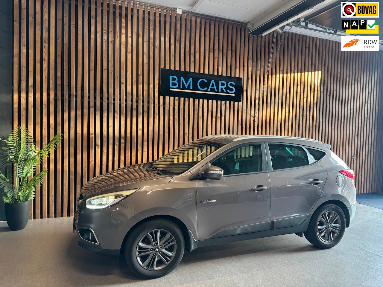 Hyundai ix35 - 1.6i GDI Go! Camera, Trekhaak, Led - AutoWereld.nl