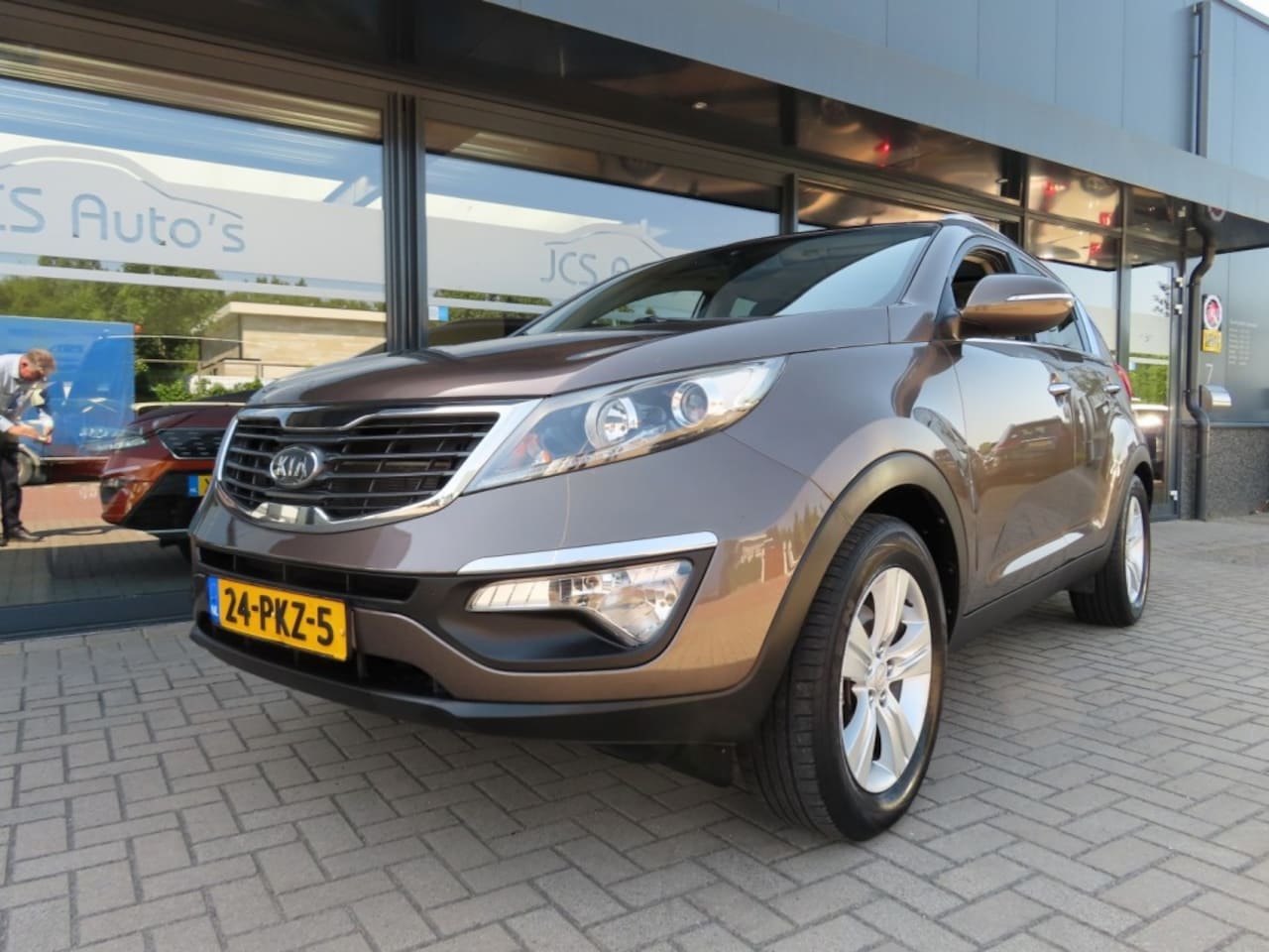Kia Sportage - 2.0 X-ECUTIVE Plus Ecc Cruise Pano Trekhaak 2011 - AutoWereld.nl