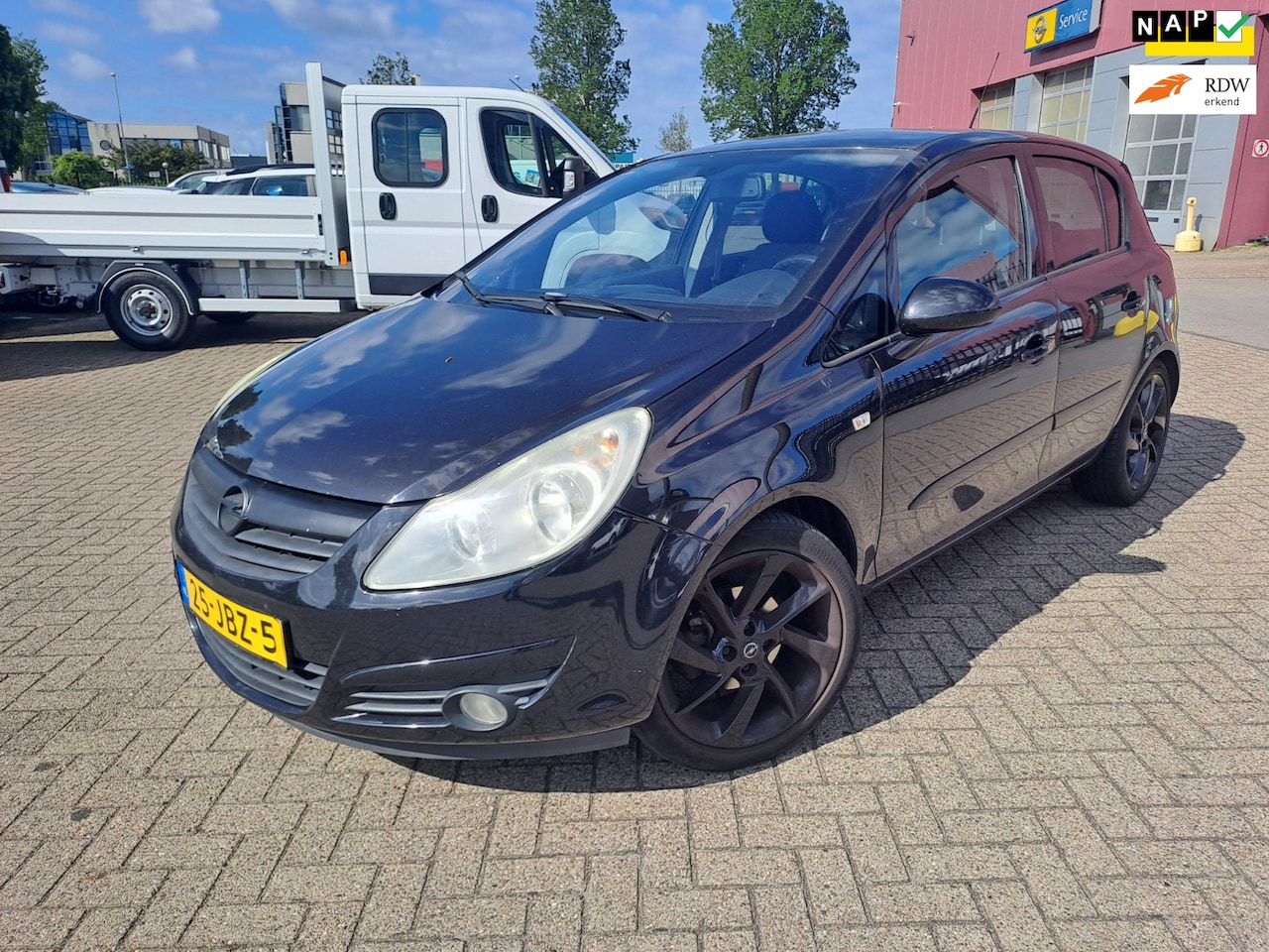 Opel Corsa - 1.4-16V Cosmo RIJDGOED/AIRCO/NAVI/LMVELG/CRUISE/ - AutoWereld.nl