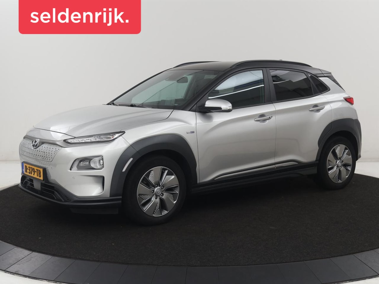 Hyundai Kona Electric - EV Fashion Design 64 kWh | SOH 94.6% | Leder | Head-up | Trekhaak | Adaptive cruise | Carp - AutoWereld.nl