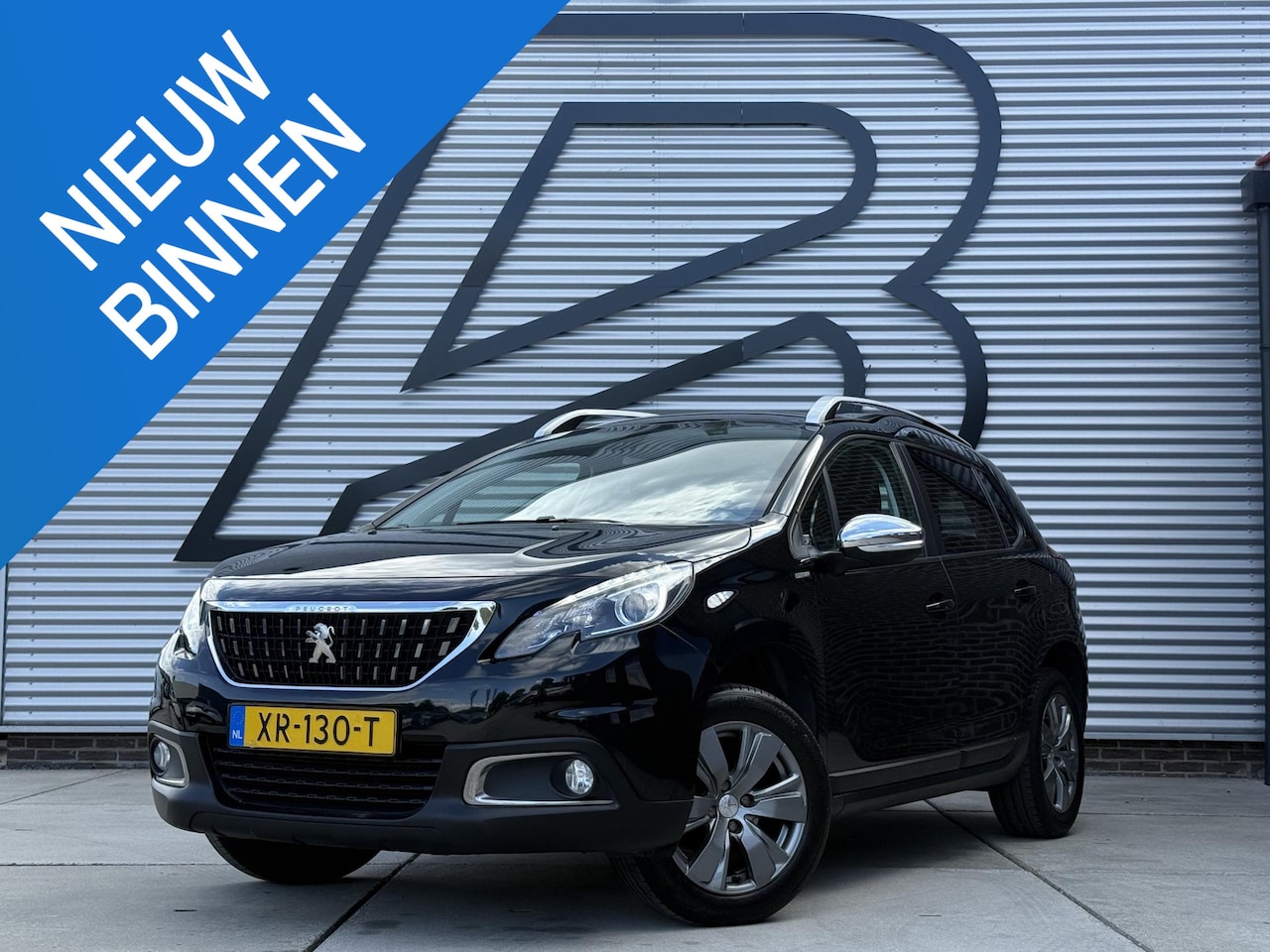 Peugeot 2008 - 1.2 PureTech Blue Lion 1e Eigenaar|Navi|D-riem vv in 2025|Clima|Cruise|Carplay|Elek Ramen| - AutoWereld.nl