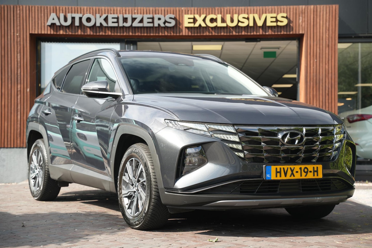 Hyundai Tucson - 1.6 T-GDI HEV i-Motion Rijstrooksensor Hill hold Dakrails DAB Apple carplay - AutoWereld.nl