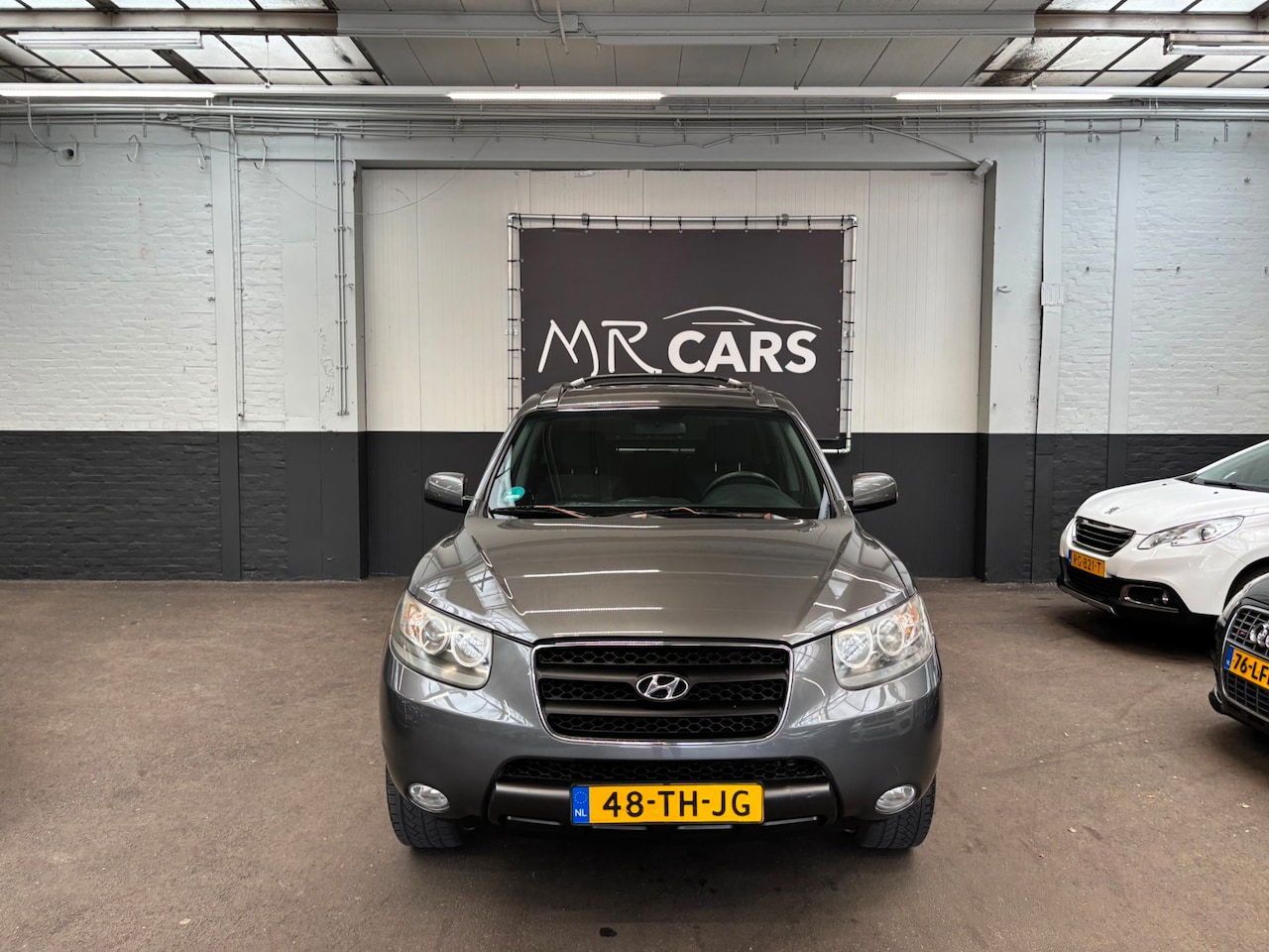 Hyundai Santa Fe - 2.7i V6 Dynamic 7p. Airco/Cruise Control - AutoWereld.nl