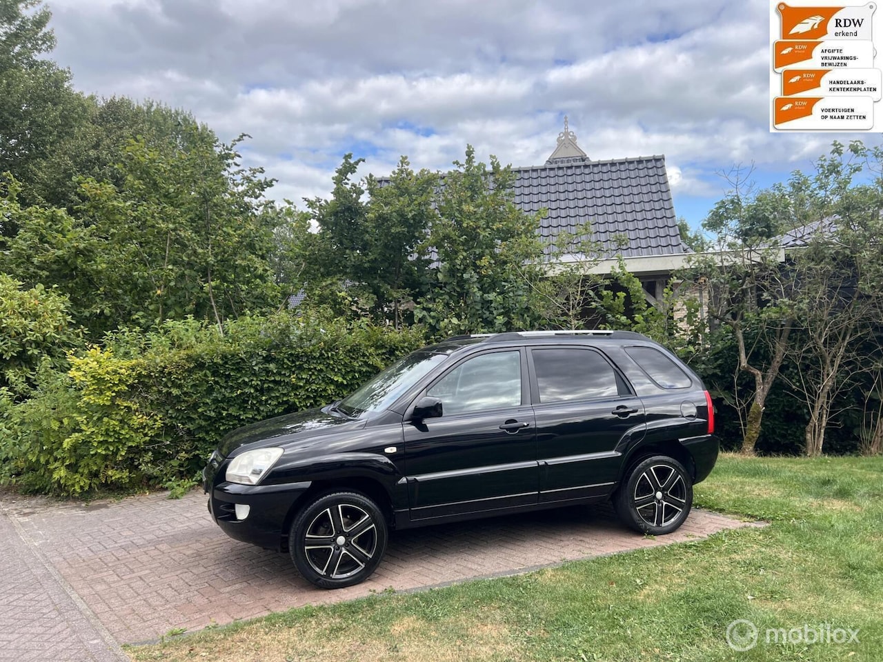 Kia Sportage - 2.0 CVVT X-ecutive 2.0 CVVT X-ecutive - AutoWereld.nl