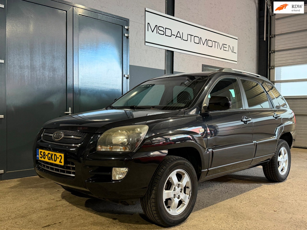 Kia Sportage - 2.0 CVVT X-cite LPG/NAP/Nieuwe APK/2WD|Leder+ stoelverwarming - AutoWereld.nl
