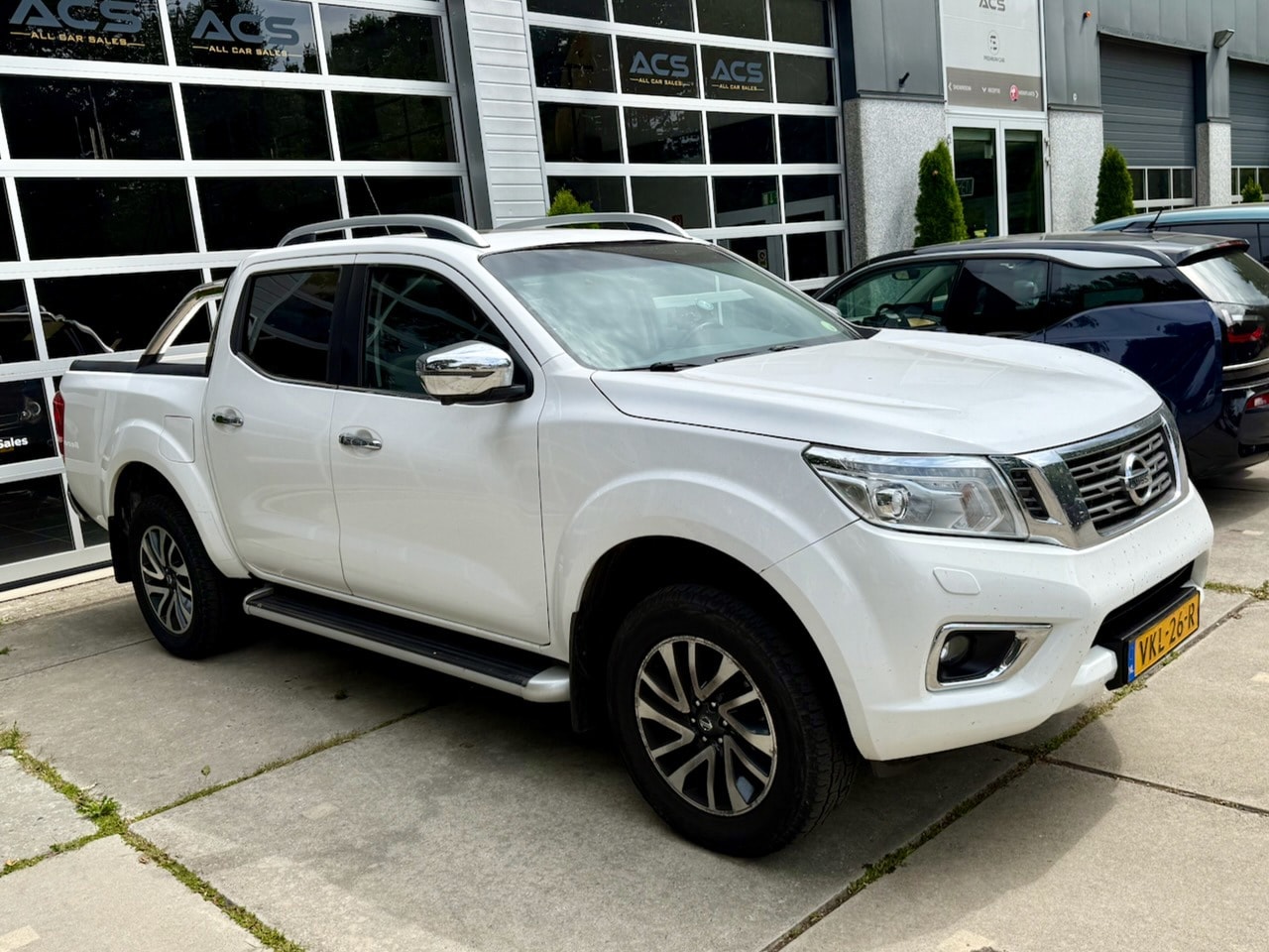 Nissan Navara - 2.3 dCi Tekna DC (5-zitplaatsen) Snoeks - AutoWereld.nl