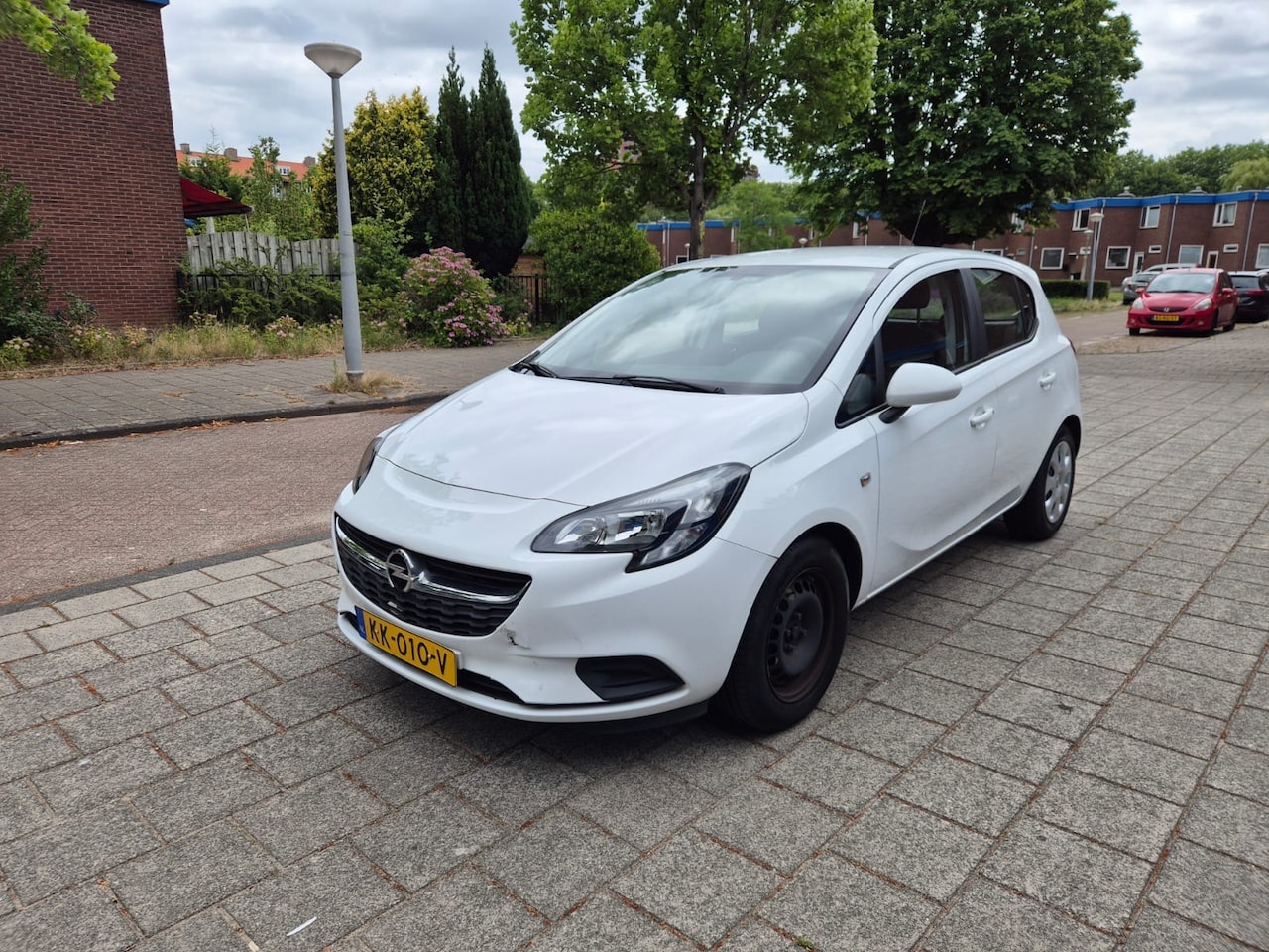Opel Corsa - 1.4 White Edition NAP Airco Cruise - AutoWereld.nl