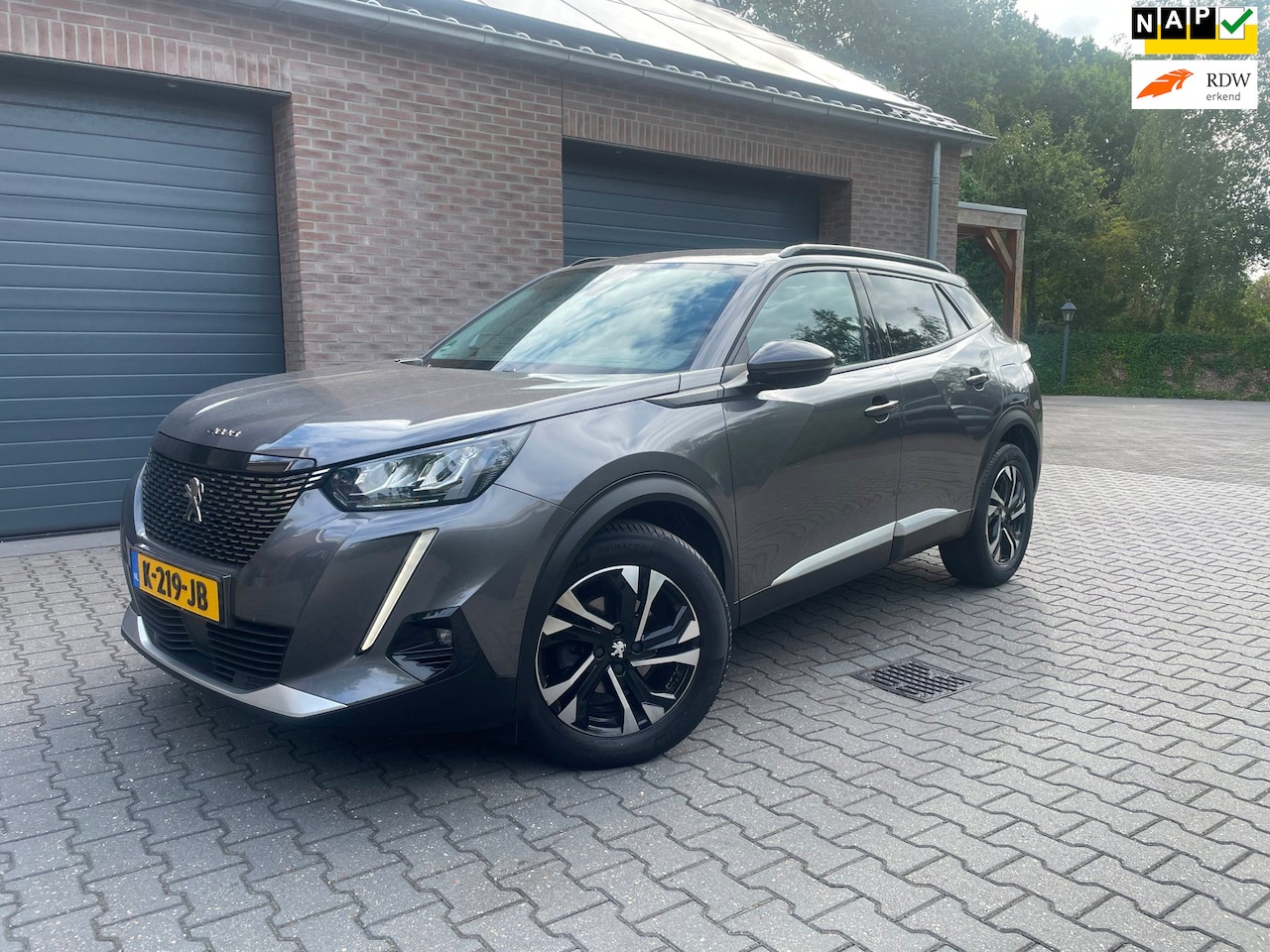 Peugeot 2008 - 1.2 PureTech Blue Lease Allure ECC NAVI APPLE CARPLAY 2020 - AutoWereld.nl