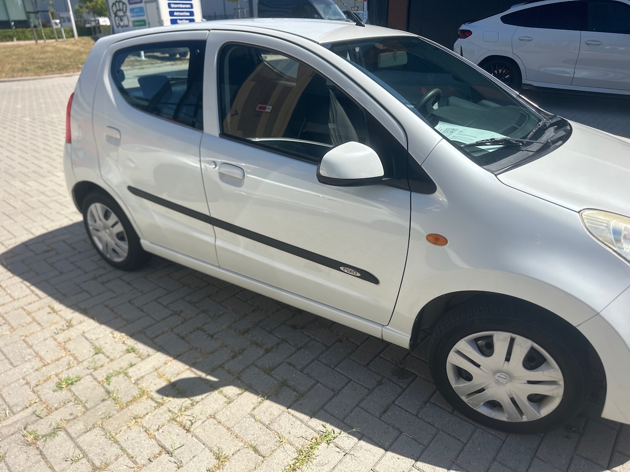 Nissan Pixo - 1.0 Acenta/ZUINIG/weinig-km/airco/elektriche-ramen/ - AutoWereld.nl