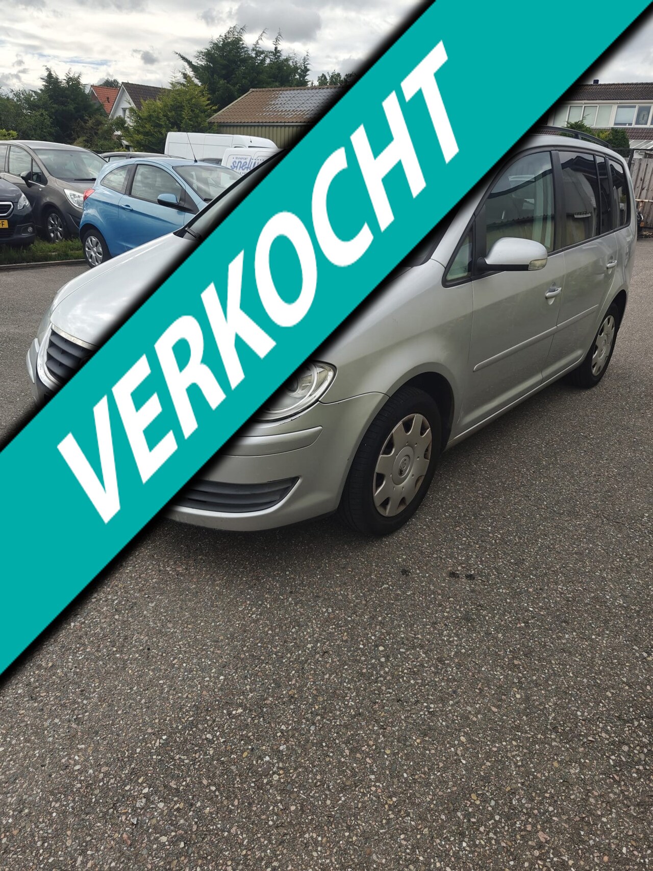Volkswagen Touran - 1.6 Comfortline Business 7PRS - AutoWereld.nl