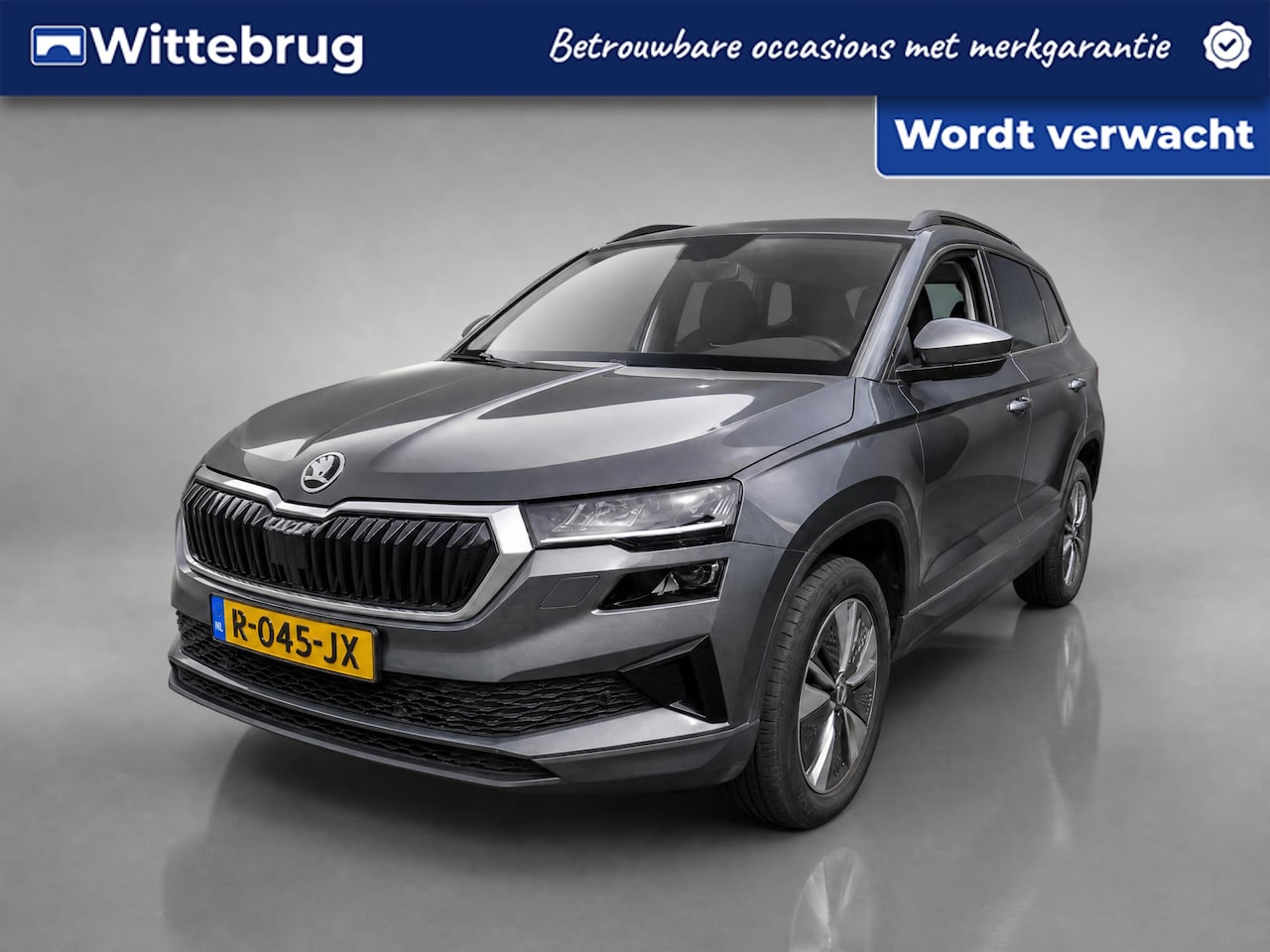 Skoda Karoq - 1.5 TSI ACT Business Edition Plus / Navigatie / App connect / Camera / Parkeersensoren V+A - AutoWereld.nl