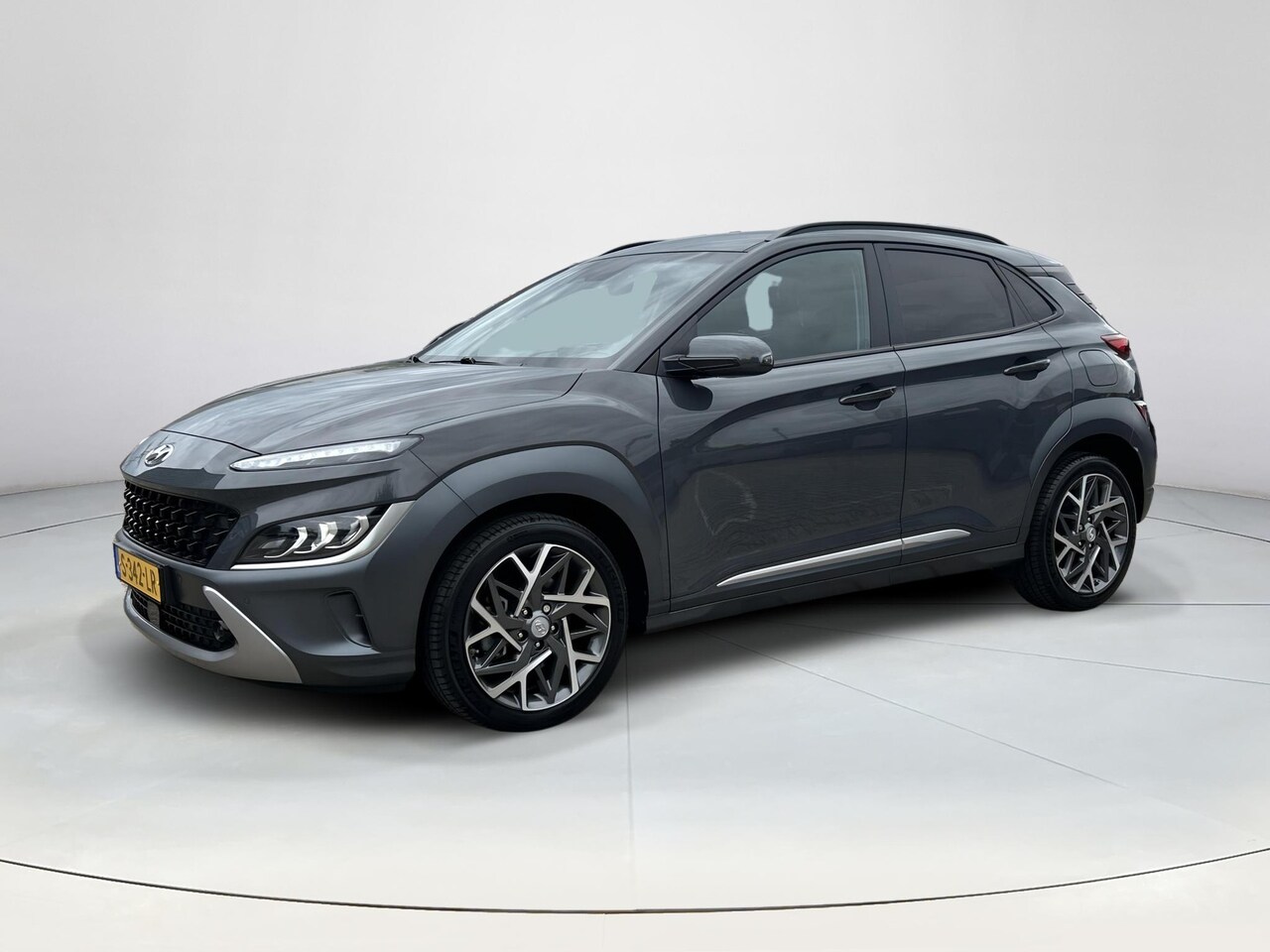 Hyundai Kona - 1.6 GDI HEV Premium | Stoelverwarming | Climate Control | Achteruitrijcamera | Navigatie | - AutoWereld.nl